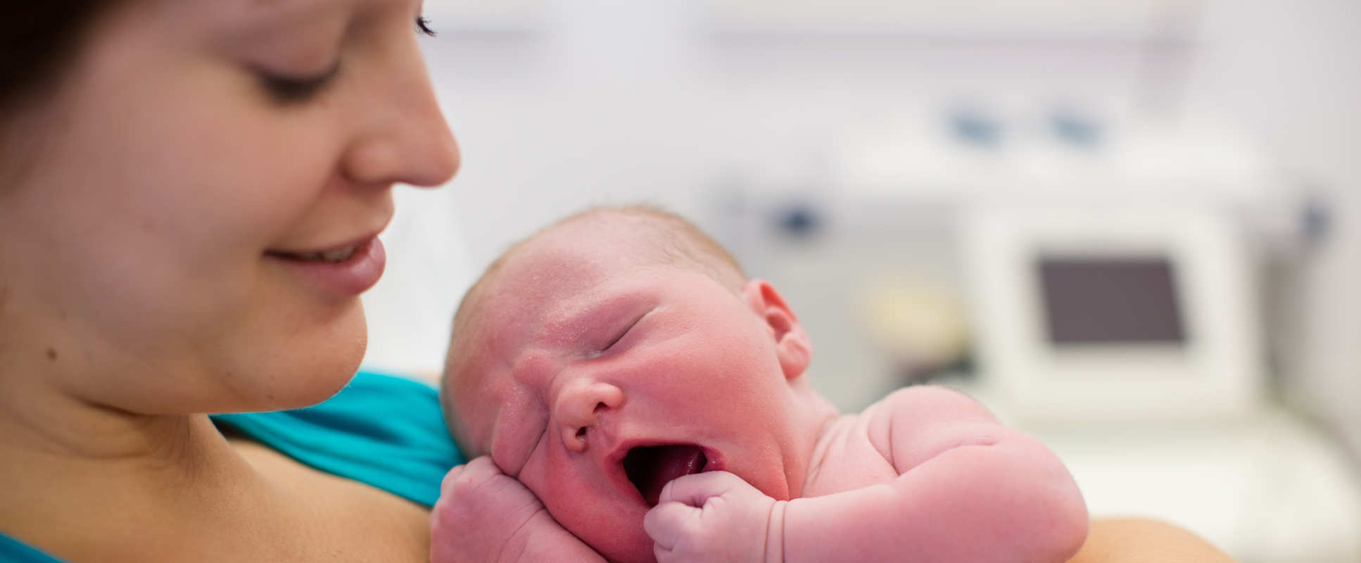 Mother with newborn infant